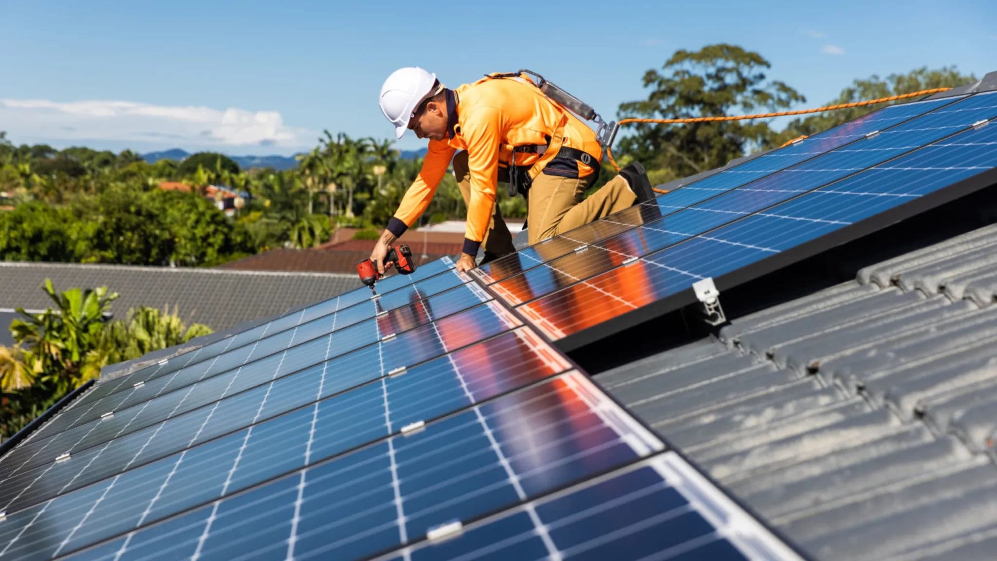 Solar panel installer at work